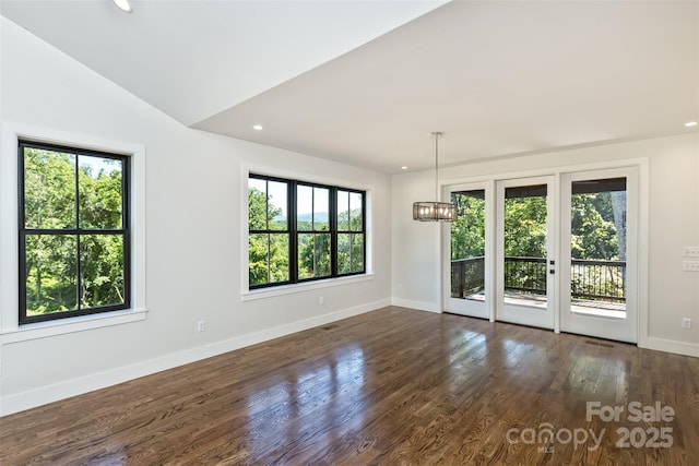 120 Gashes Creek Rd, Asheville, NC 28805 - unfurnished room featuring healthy amount of natural light, recessed lighting, dark wood-style floors, and a chandelier
