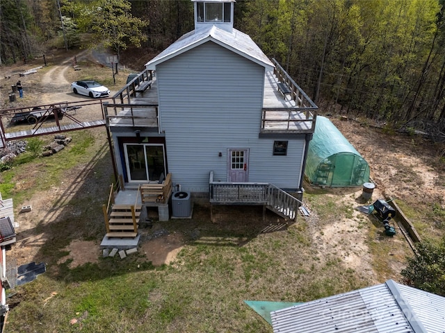 2668 Reedy Branch Rd, Purlear, NC 28665 - back of house featuring a view of trees, stairs, a deck, and an exterior structure