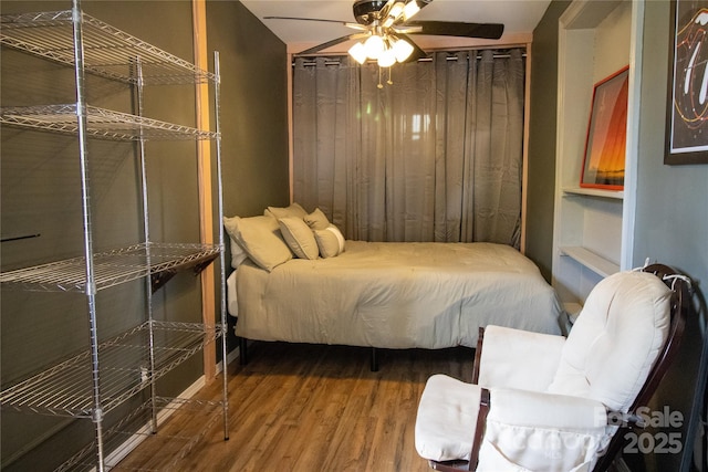 2668 Reedy Branch Rd, Purlear, NC 28665 - bedroom featuring wood finished floors and a ceiling fan