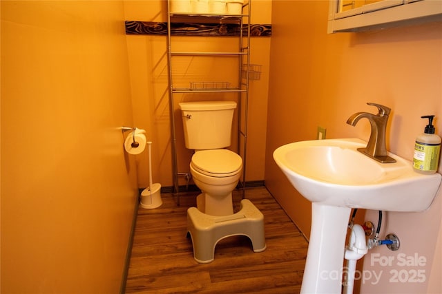 2668 Reedy Branch Rd, Purlear, NC 28665 - bathroom with wood finished floors and toilet