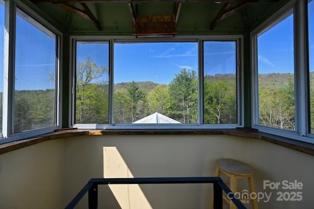 2668 Reedy Branch Rd, Purlear, NC 28665 - unfurnished sunroom with a view of trees