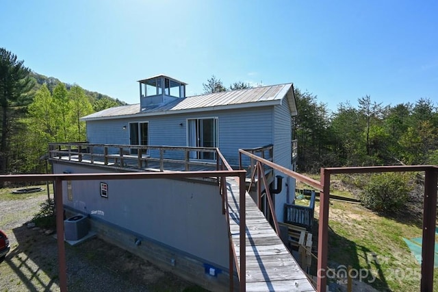 2668 Reedy Branch Rd, Purlear, NC 28665 - rear view of property featuring a metal roof and a wooden deck