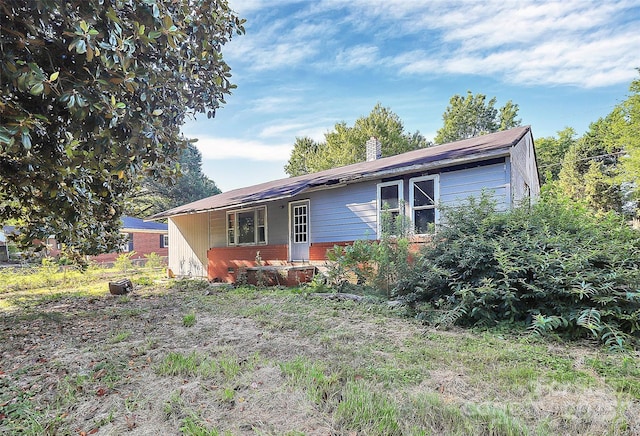 112 Harmony Trl, Gastonia, NC 28056 - view of front of home featuring a chimney and brick siding