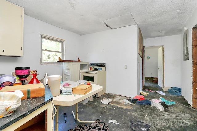 112 Harmony Trl, Gastonia, NC 28056 - kitchen with white range with electric cooktop and a textured ceiling