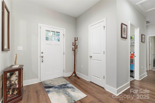 7516 Ohara St, Huntersville, NC 28078 - foyer entrance featuring wood finished floors