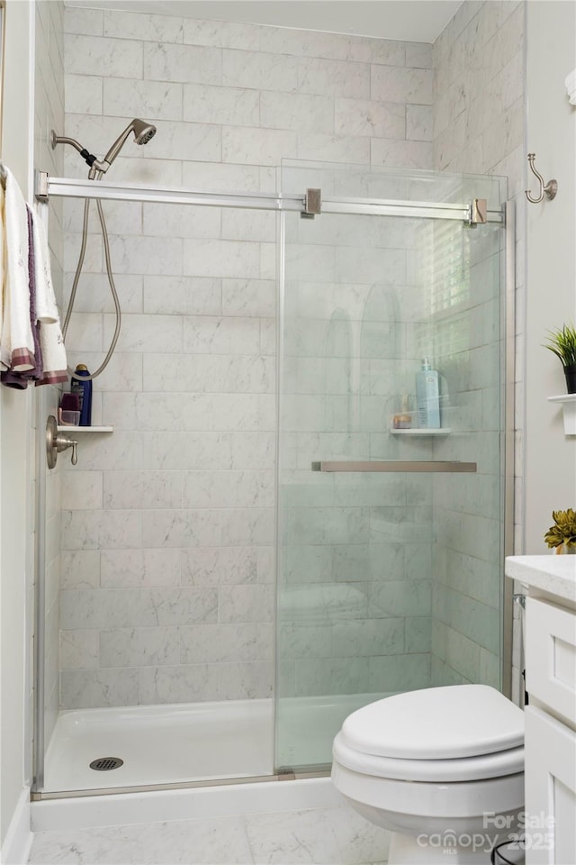 7516 Ohara St, Huntersville, NC 28078 - bathroom featuring a shower stall, vanity, and marble look tile flooring