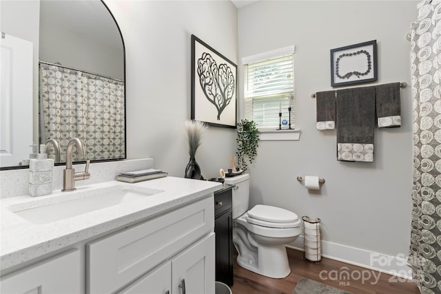 7516 Ohara St, Huntersville, NC 28078 - bathroom featuring vanity and wood finished floors