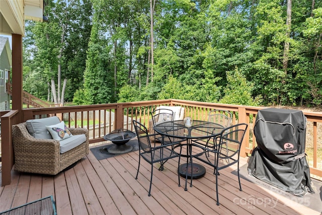 7516 Ohara St, Huntersville, NC 28078 - deck with a fire pit, outdoor dining space, and a grill