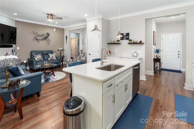 7516 Ohara St, Huntersville, NC 28078 - kitchen with light countertops, ceiling fan, hanging light fixtures, open floor plan, and recessed lighting
