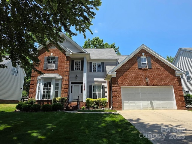 10607 Old Bridge Ln, Charlotte, NC 28269 - view of front facade with driveway, brick siding, a front lawn, and a garage