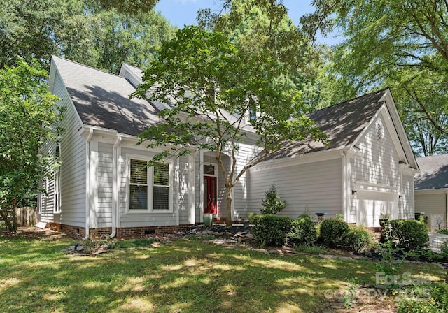 9141 Covey Hollow Ct, Charlotte, NC 28210 - view of front facade with a front lawn, a shingled roof, crawl space, and an attached garage