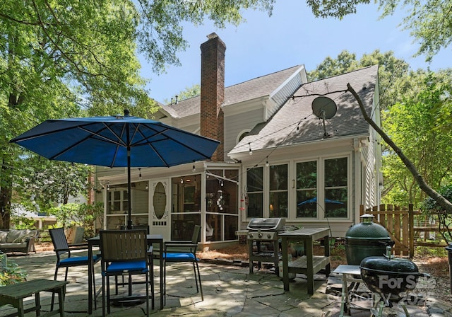 9141 Covey Hollow Ct, Charlotte, NC 28210 - view of patio / terrace with a sunroom and area for grilling