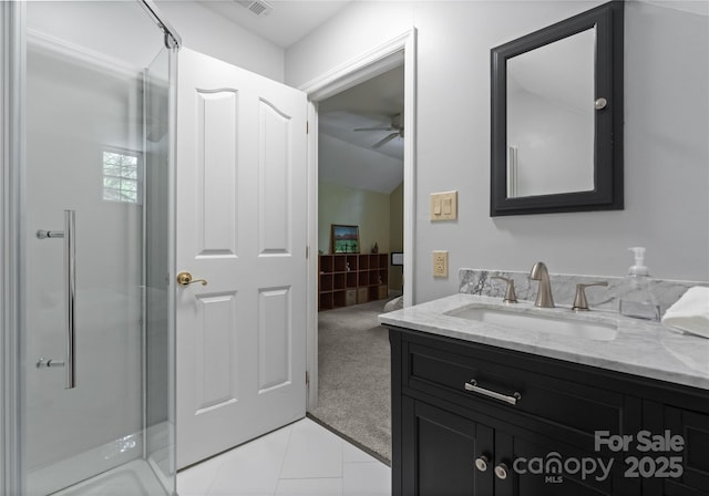 9141 Covey Hollow Ct, Charlotte, NC 28210 - full bathroom with vanity, a shower stall, a ceiling fan, tile patterned flooring, and lofted ceiling
