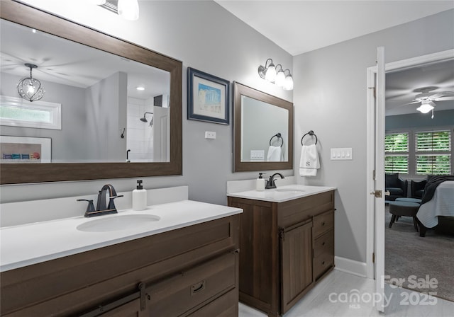 9141 Covey Hollow Ct, Charlotte, NC 28210 - ensuite bathroom with two vanities, a ceiling fan, and a shower