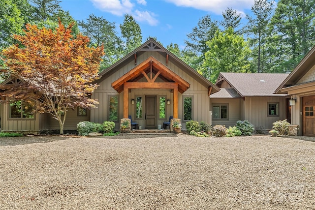 429 Turtle Head Dr, Nebo, NC 28761 - view of front facade with board and batten siding, driveway, and a garage