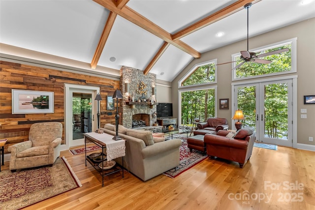 429 Turtle Head Dr, Nebo, NC 28761 - living area with high vaulted ceiling, french doors, healthy amount of natural light, beamed ceiling, and wood finished floors
