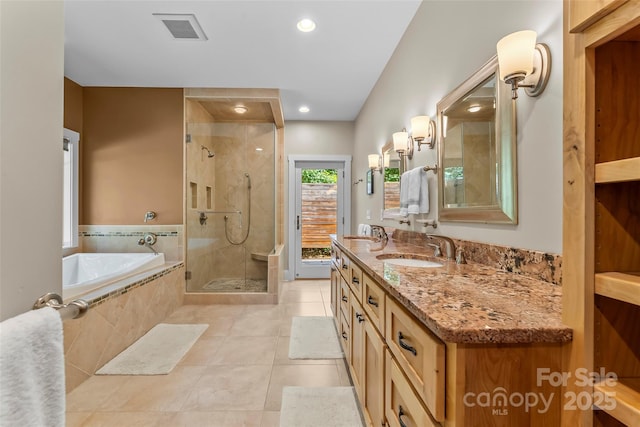 429 Turtle Head Dr, Nebo, NC 28761 - bathroom featuring a bath, tile patterned floors, a shower stall, double vanity, and recessed lighting