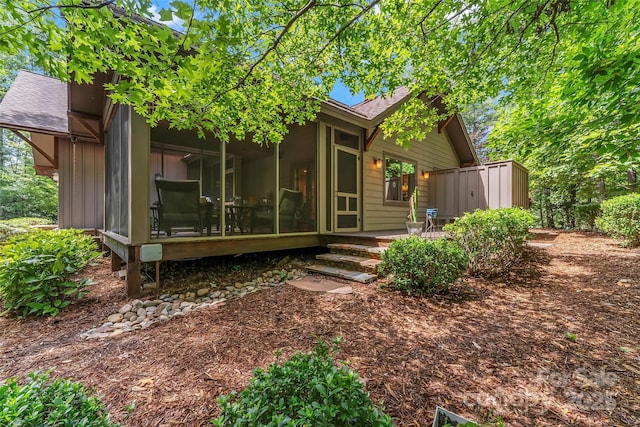 429 Turtle Head Dr, Nebo, NC 28761 - back of property featuring a sunroom and a shingled roof