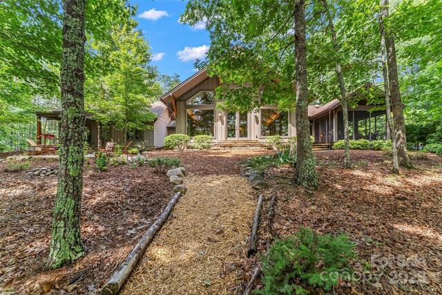 429 Turtle Head Dr, Nebo, NC 28761 - rear view of house featuring a sunroom