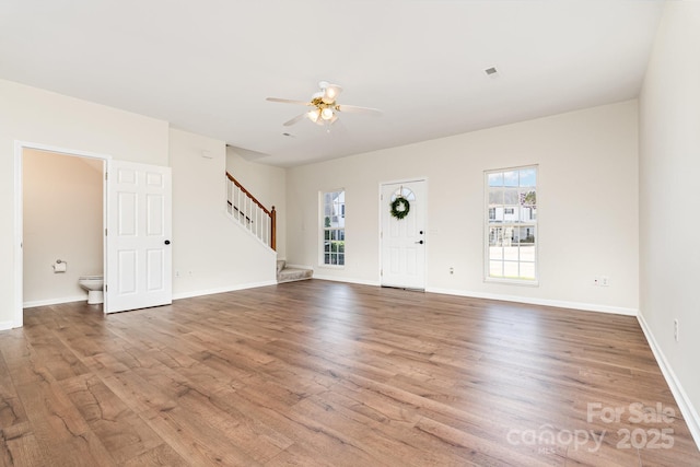 28 Ridgestone Cir, Mauldin, SC 29662 - entrance foyer with plenty of natural light, stairway, ceiling fan, and wood finished floors