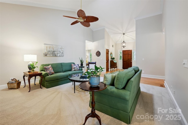 5008 Saddle Horn Trl, Weddington, NC 28104 - carpeted living room featuring high vaulted ceiling, crown molding, and a ceiling fan