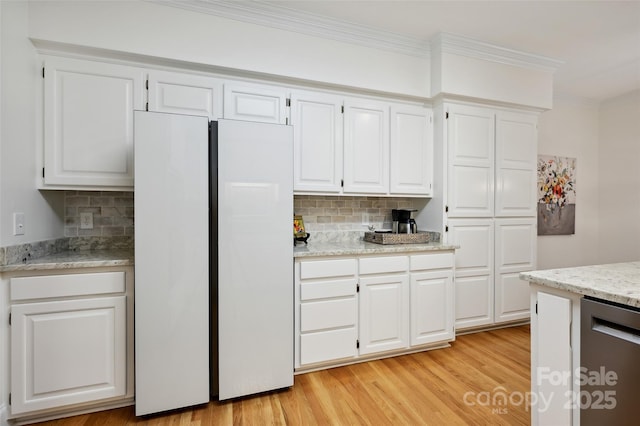 5008 Saddle Horn Trl, Weddington, NC 28104 - kitchen with freestanding refrigerator, crown molding, dishwasher, decorative backsplash, and white cabinetry
