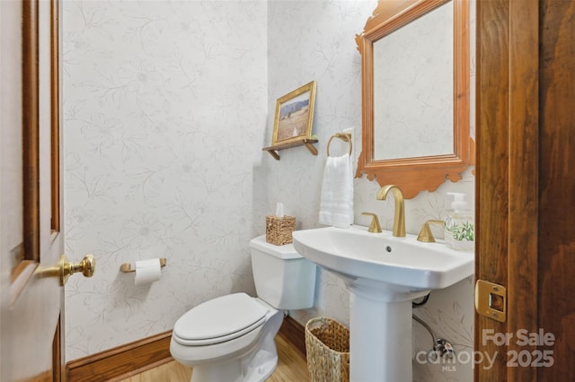 5008 Saddle Horn Trl, Weddington, NC 28104 - half bathroom with wallpapered walls and wood finished floors
