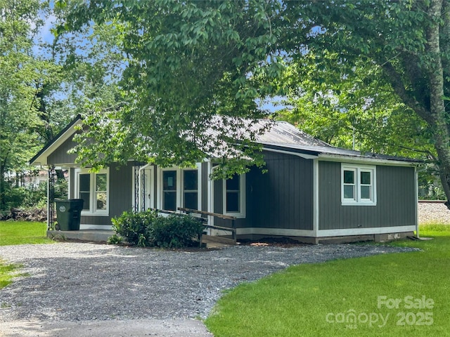 36 Graybark Ct, Waynesville, NC 28786 - view of front facade featuring a front lawn and covered porch