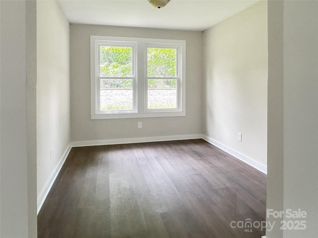 36 Graybark Ct, Waynesville, NC 28786 - unfurnished room featuring dark wood-style flooring and baseboards
