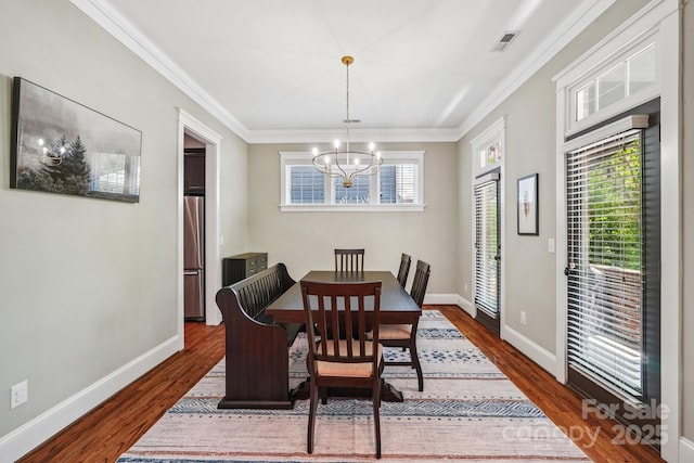 739 Terrace Park, Rock Hill, SC 29730 - dining room with a chandelier, ornamental molding, and dark wood-type flooring