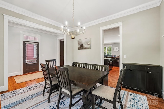 739 Terrace Park, Rock Hill, SC 29730 - dining area featuring light wood-type flooring, a chandelier, and crown molding