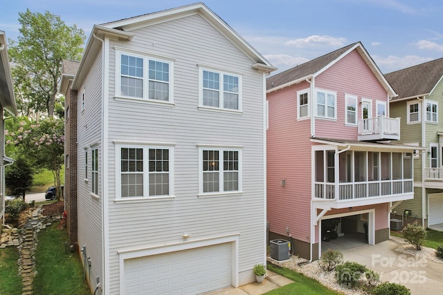 739 Terrace Park, Rock Hill, SC 29730 - back of property featuring an attached garage, driveway, and a sunroom