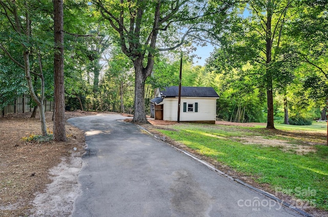422 Wagner St, Troutman, NC 28166 - view of front of house with asphalt driveway and a front lawn