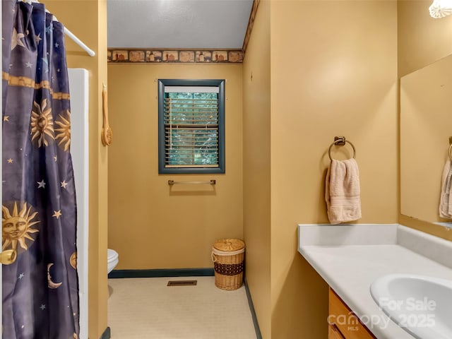57 Copperhead Cv, Sylva, NC 28779 - bathroom with vanity and a shower with shower curtain
