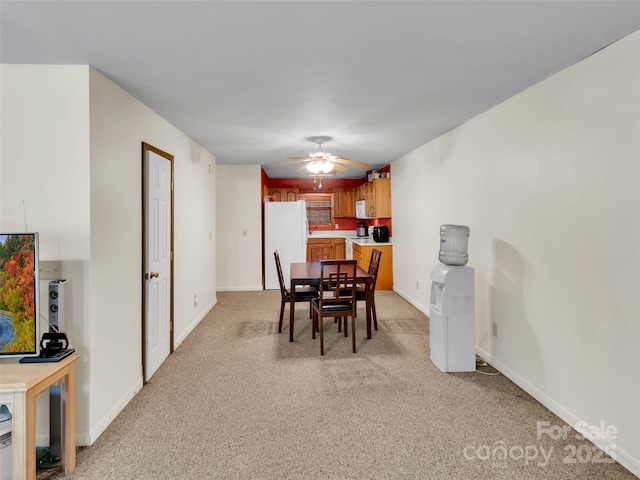 57 Copperhead Cv, Sylva, NC 28779 - dining room featuring light colored carpet and ceiling fan
