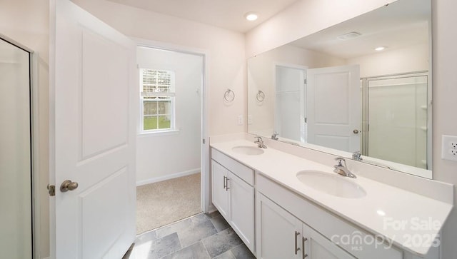462 Janie Cir Unit 100, Newton, NC 28658 - bathroom featuring double vanity, a shower with shower door, and stone finish floors