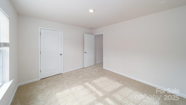462 Janie Cir Unit 100, Newton, NC 28658 - unfurnished bedroom featuring light carpet