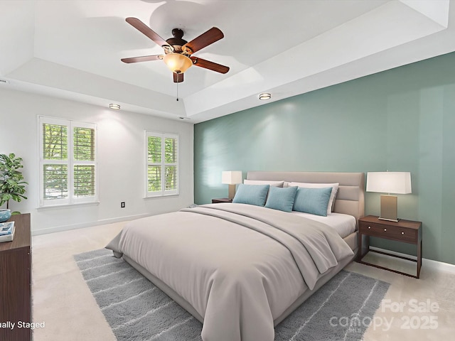 11126 Windgate Ct, Tega Cay, SC 29708 - carpeted bedroom with a raised ceiling and a ceiling fan