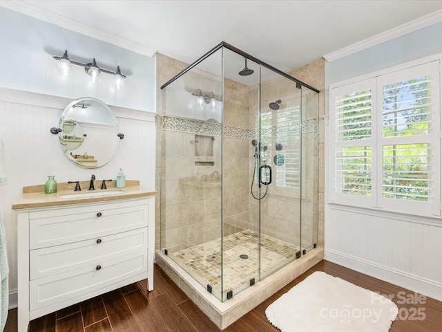 11126 Windgate Ct, Tega Cay, SC 29708 - full bath featuring wood finished floors, a stall shower, vanity, and crown molding