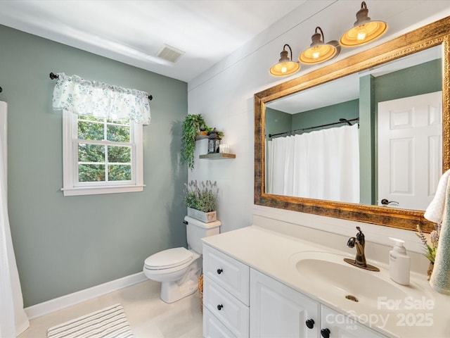 11126 Windgate Ct, Tega Cay, SC 29708 - bathroom with vanity and tile patterned flooring