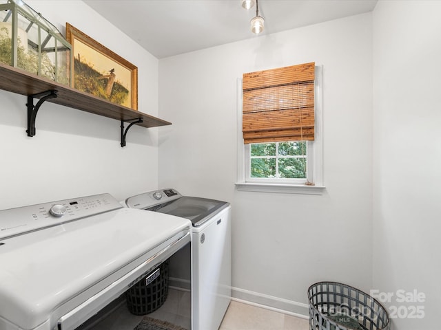 11126 Windgate Ct, Tega Cay, SC 29708 - laundry area featuring washer and dryer and light tile patterned floors