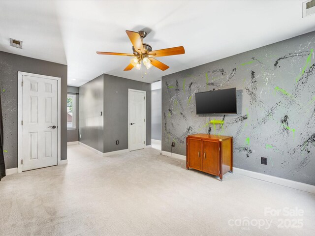11126 Windgate Ct, Tega Cay, SC 29708 - unfurnished living room featuring ceiling fan and light carpet