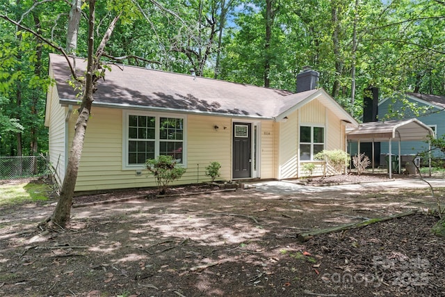 5534 Great Wagon Rd, Charlotte, NC 28215 - single story home with a chimney and roof with shingles