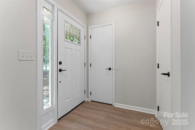 5534 Great Wagon Rd, Charlotte, NC 28215 - foyer featuring light wood finished floors and baseboards