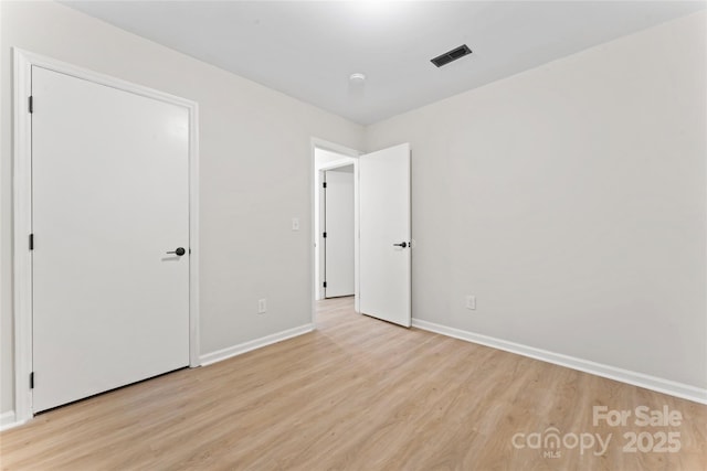 5534 Great Wagon Rd, Charlotte, NC 28215 - unfurnished bedroom featuring light wood finished floors