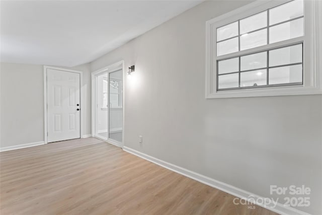 5534 Great Wagon Rd, Charlotte, NC 28215 - unfurnished room with baseboards and wood finished floors
