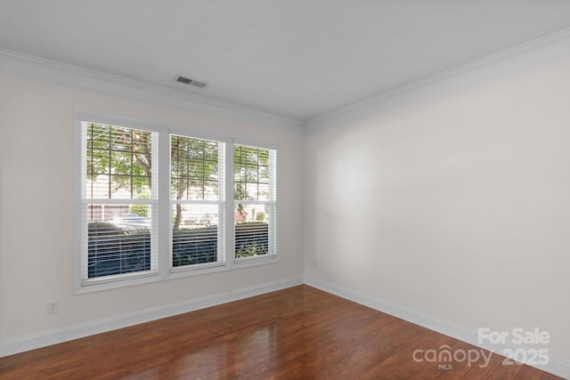 8325 Burgundy Ridge Dr, Harrisburg, NC 28075 - unfurnished room featuring dark wood-style flooring and crown molding
