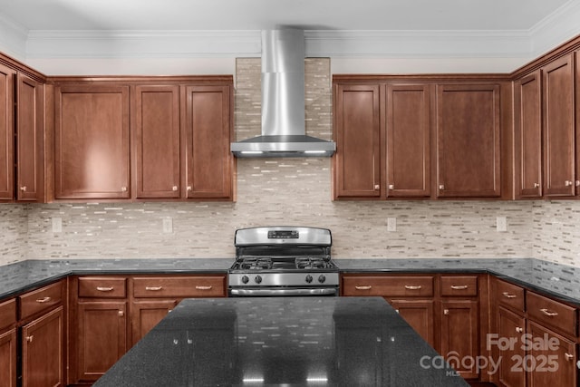 8325 Burgundy Ridge Dr, Harrisburg, NC 28075 - kitchen featuring stainless steel range with gas cooktop, wall chimney exhaust hood, ornamental molding, and dark stone countertops