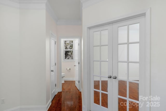 8325 Burgundy Ridge Dr, Harrisburg, NC 28075 - hallway with french doors, ornamental molding, and wood finished floors