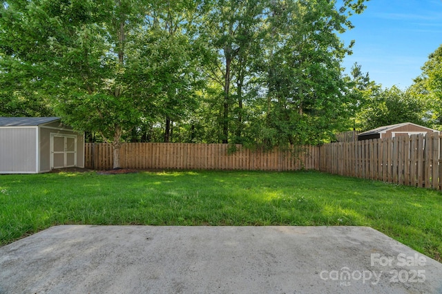 8325 Burgundy Ridge Dr, Harrisburg, NC 28075 - fenced backyard with a storage unit and a patio